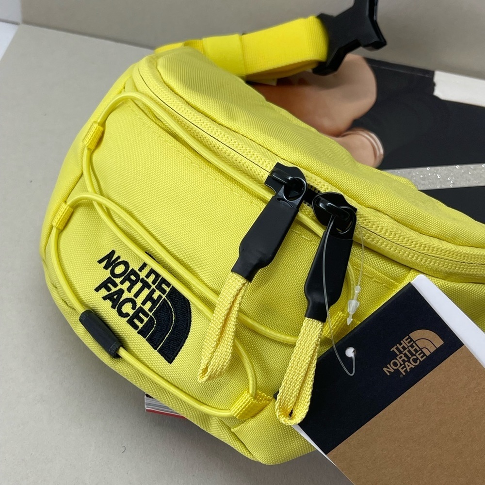 (ew+tag) The North Face belt bag / sling pack yellow black